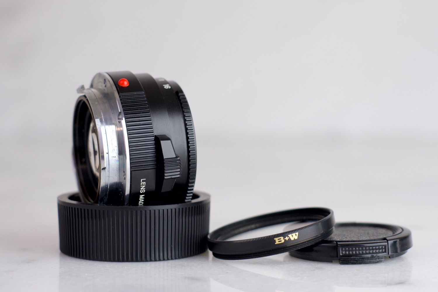 Minolta M Rokkor 40mm F/2 Lens with B+W UV Filter, Front and Rear